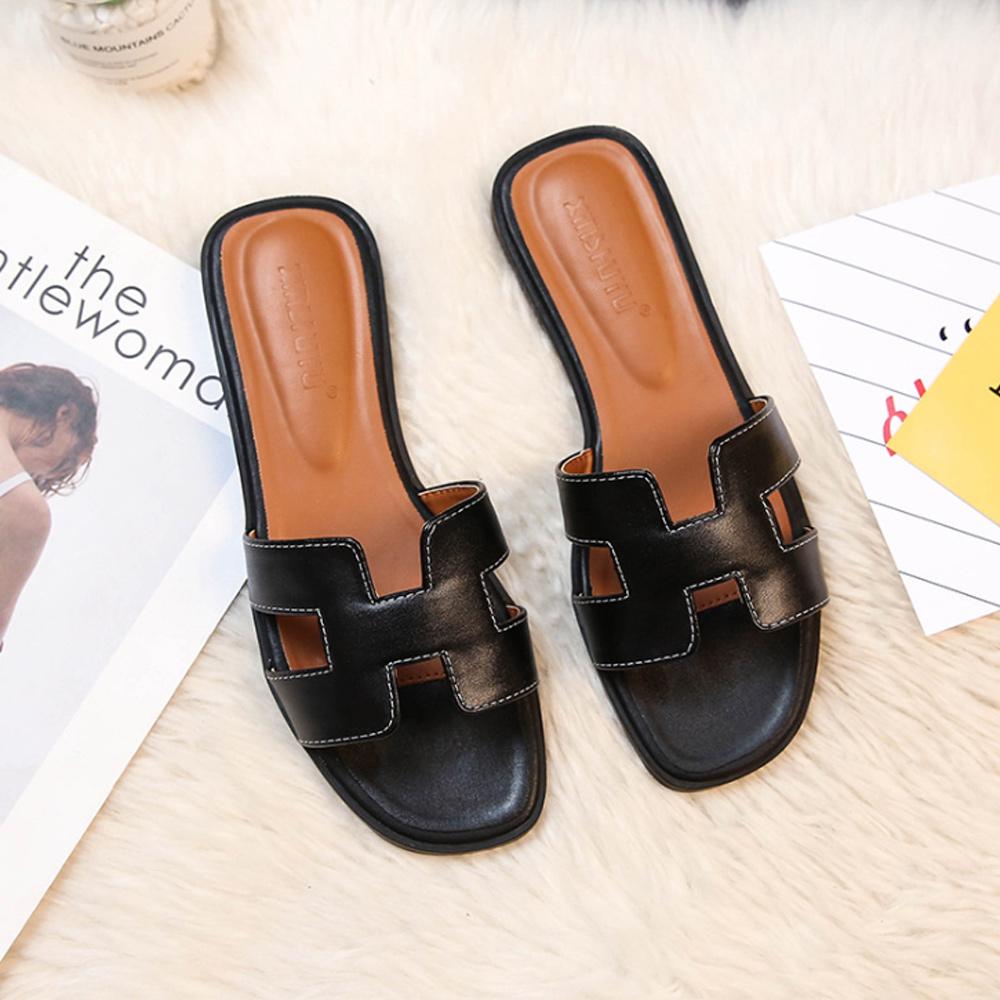 Lyra sandals worn with a summer outfit