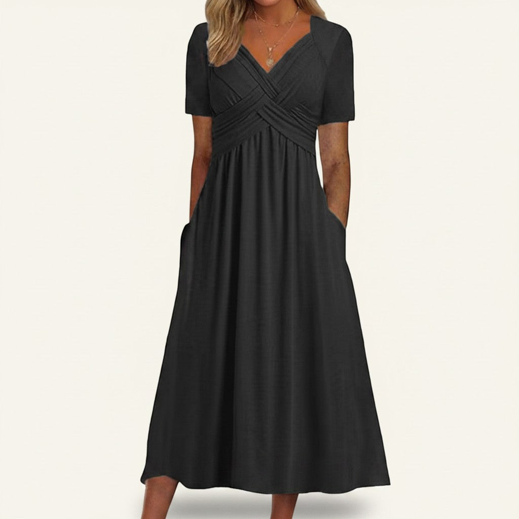 Robe midi fluide Doglory noire avec col en V croisé, manches courtes et poches latérales pratiques